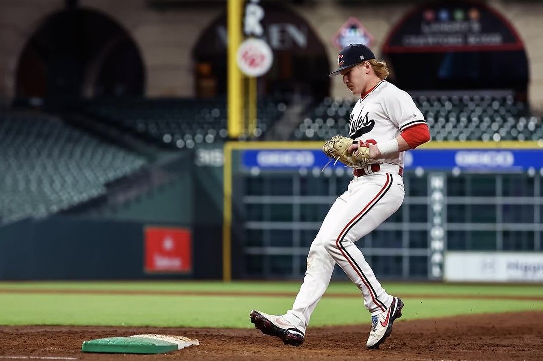 Mules first baseman stepping on the bag in Houston