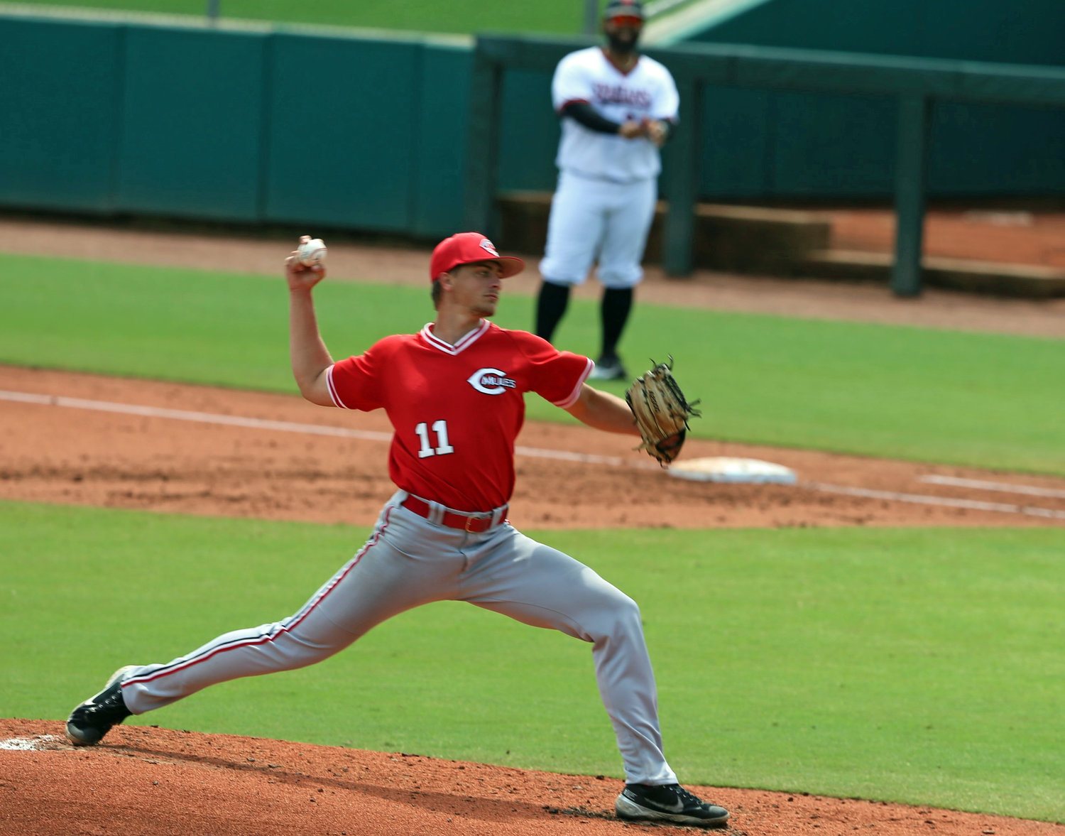 Conor Dryer pitching for the Mules